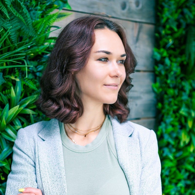 Portrait of Marina Karaneuska, International Exit Strategy's Team Alignment Coach and Talent Profiler, fostering resilient, emotionally intelligent teams.